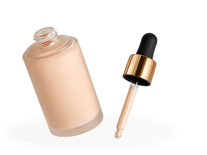 Open foundation bottle with dropper on black.